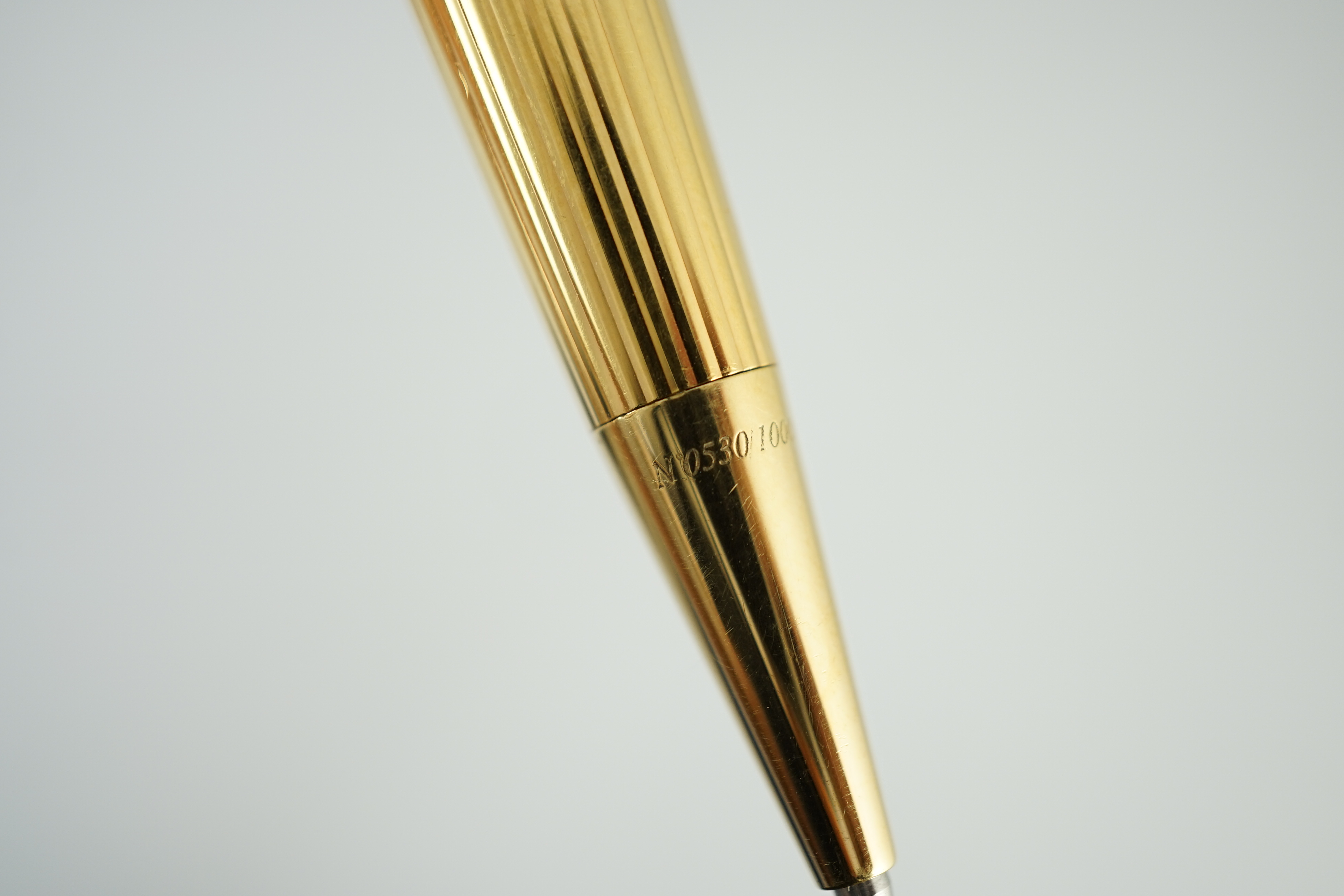 A Cartier gold plated loupe limited edition ballpoint pen
